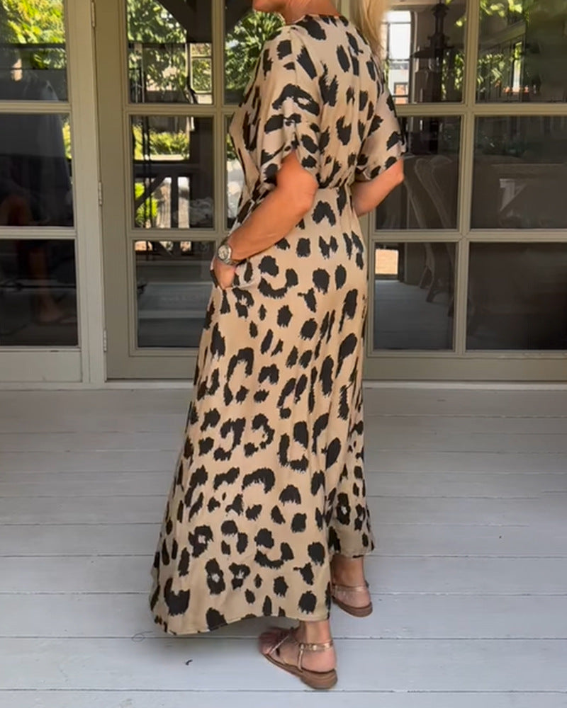 Svilena obleka z leopardjim potiskom